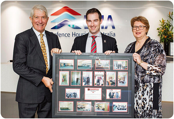 Mr John Bale, CEO of Soldier On, presents our Chairman, the Hon Sandy Macdonald and Acting Managing Director, Ms Jan Mason, with a plaque for DHA's support of the official opening of the Robert Poate Reintegration and Recovery Centre in Canberra, ACT.