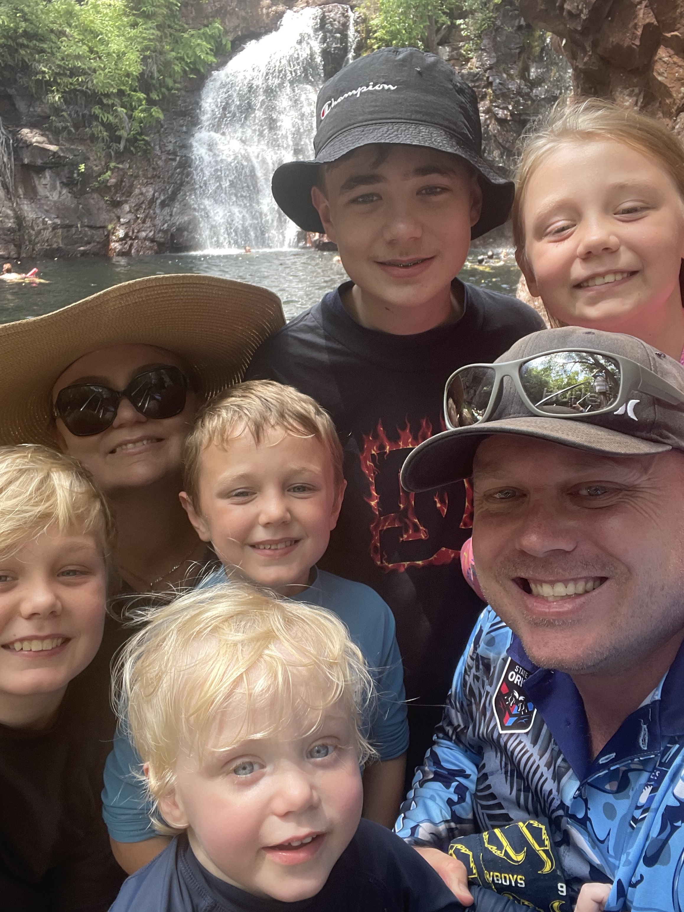 Emma at waterfall with family