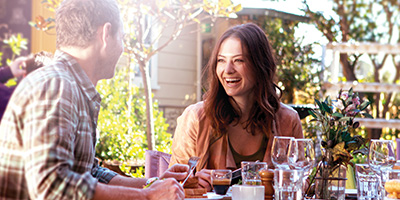 Happy couple having lunch together at a cafe