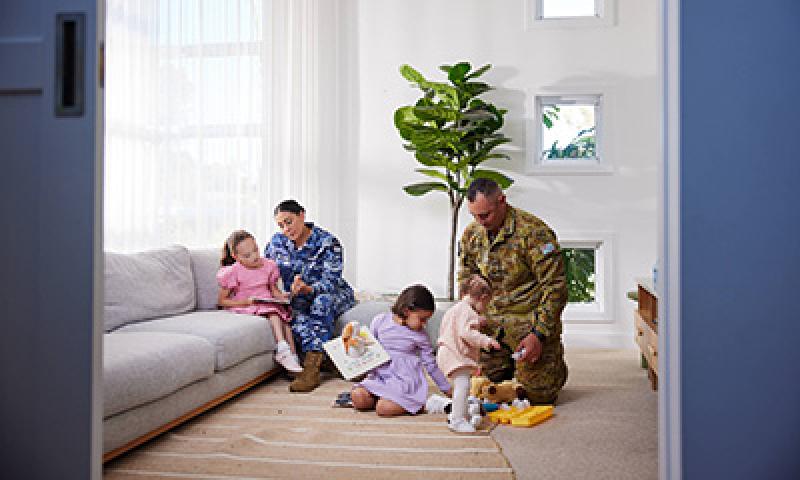 Family playing in living room